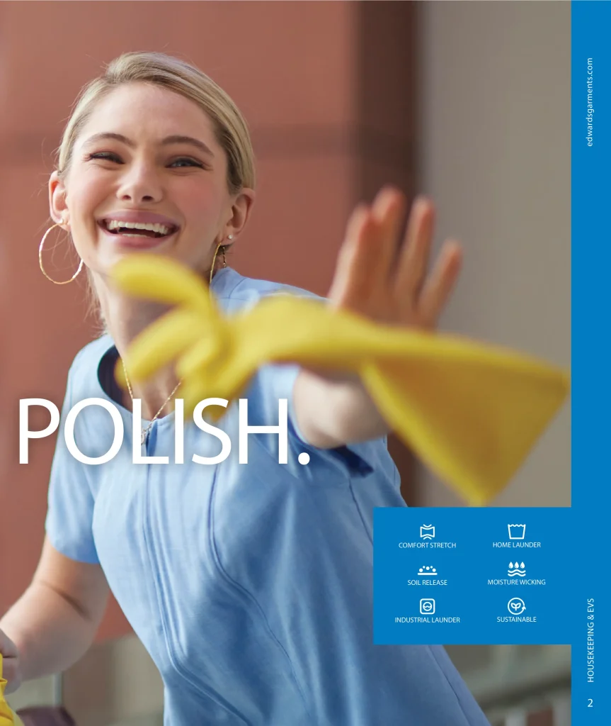 Woman in a light blue Edwards tunic with fabric feature icons, Polish.
