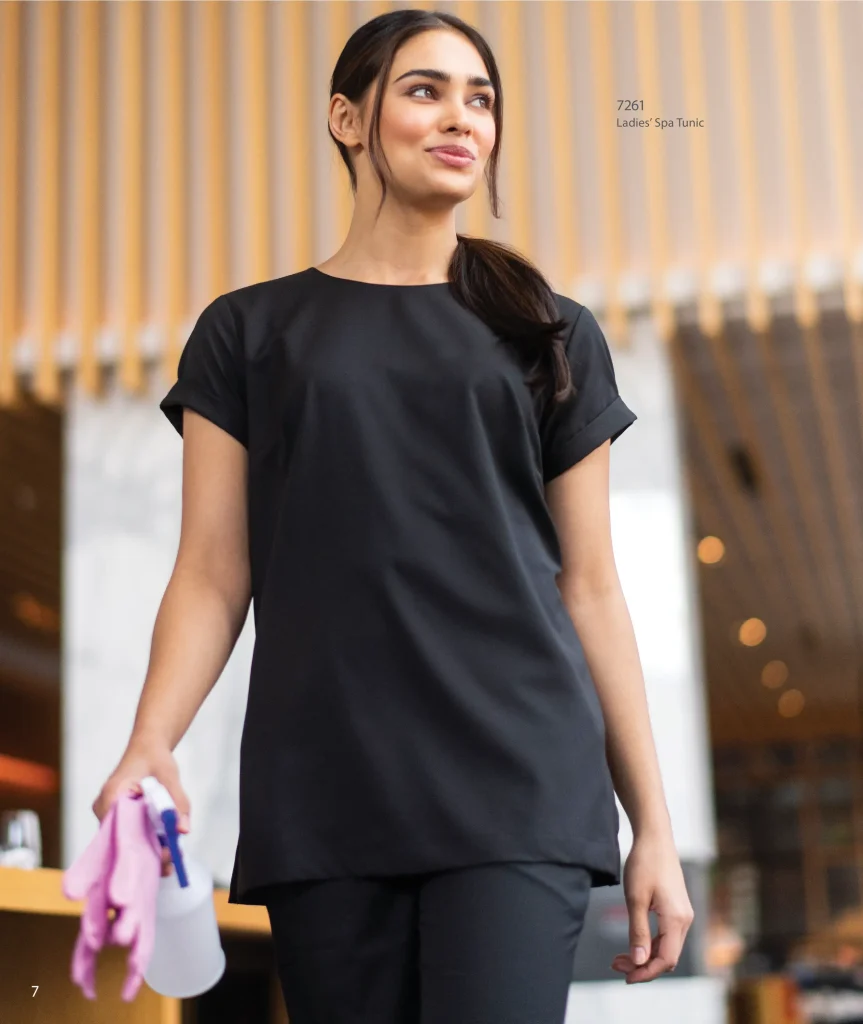 Woman in a black Edwards ladies’ spa tunic 7261